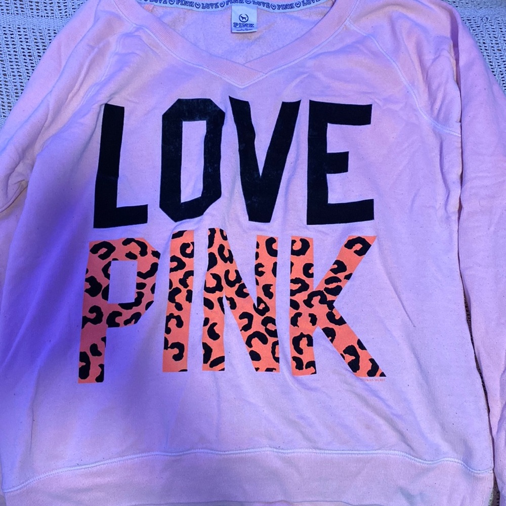 pink, salmon color sweatshirt